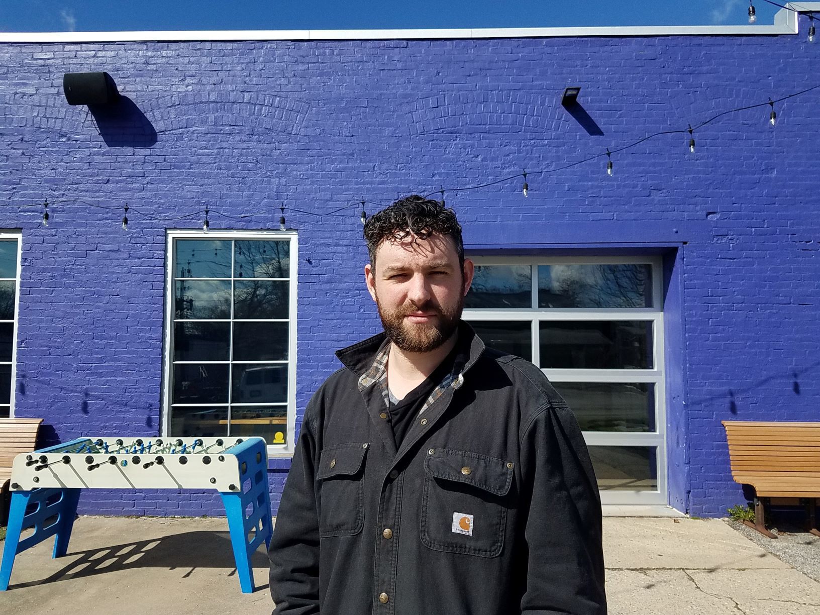 Conner Green in front of Tube Factory artspace